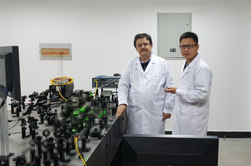 Prof.  Goncharov and post doctoral researcher are conducting laser heating experiments
