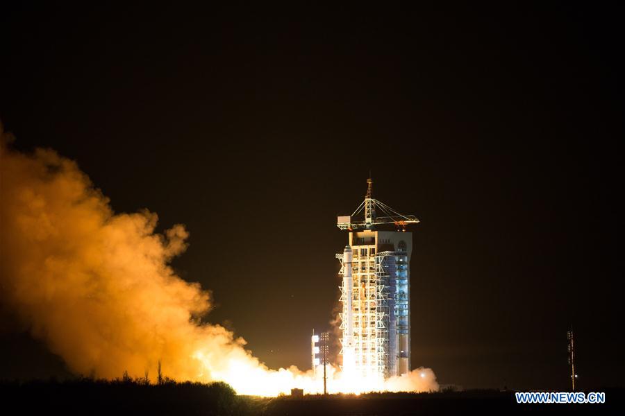 vThe Long March-2D rocket carrying a carbon dioxide monitoring satellite blasts off from the launch pad at the Jiuquan Satellite Launch Center in Jiuquan, northwest China